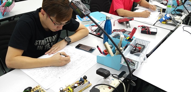 singapore student study electronics repair