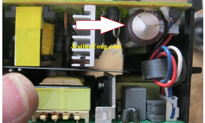 bulged capacitor in power supply