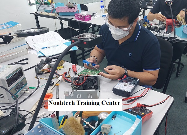 Infineon staff taking electronics repair course in noahtech