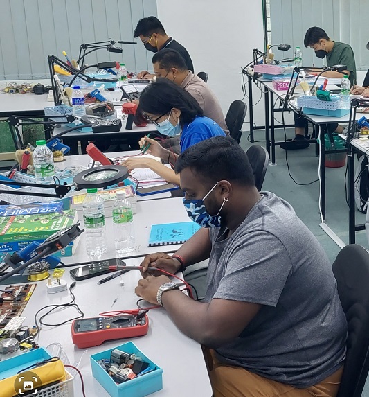 singapore student attend electronics repair course