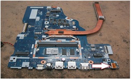 A Broken Charging Port On A Laptop Mother Board Replaced